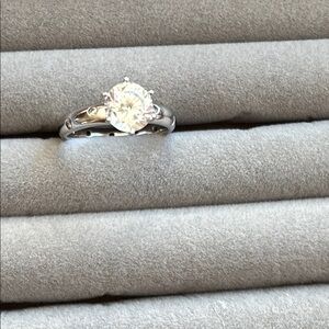 Elegant Silver Diamonique ring with scattered stones size 7-7.5